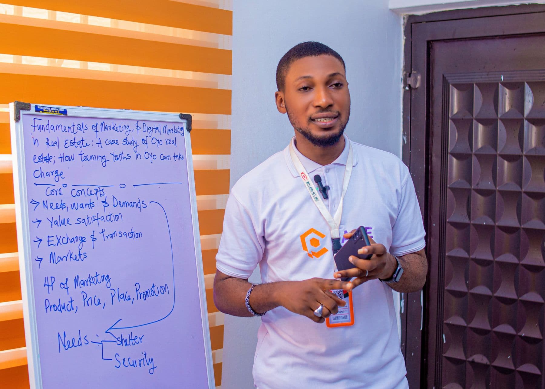 A facilitator teaching at the flipchart