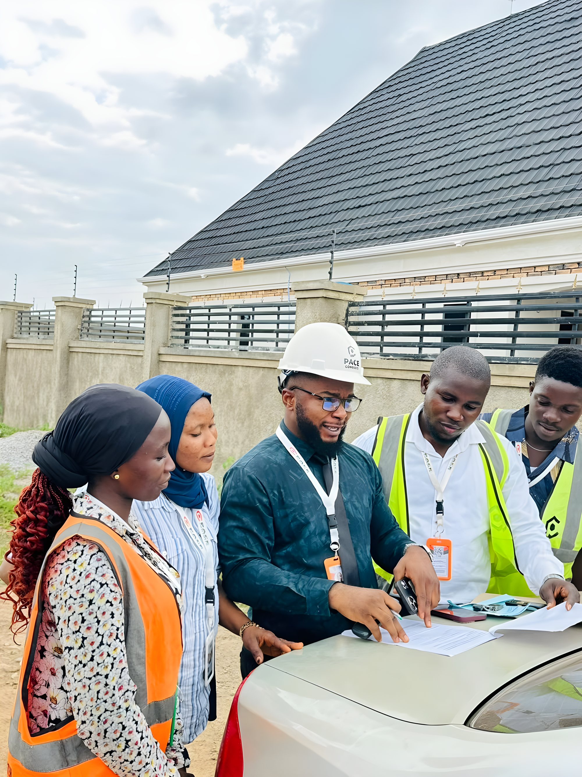 Reviewing the building plan on site